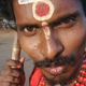 Early one morning in Andhra Pradesh’s Rajahmundry, this municipal street cleaner came very close to the lens for his portrait. Not speaking Telugu, we could only smile and part ways.